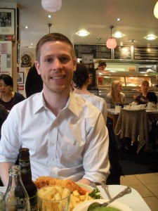 Dan enjoying fish and chips at Poppies