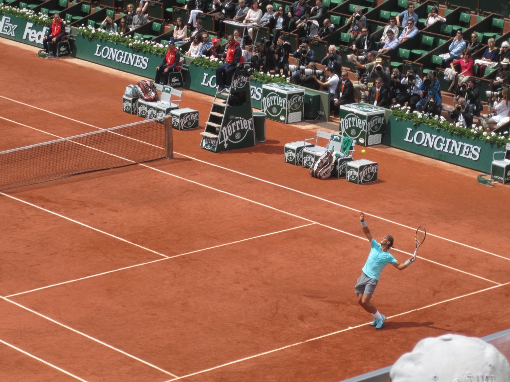 Rafael Nadal, mid-serve.